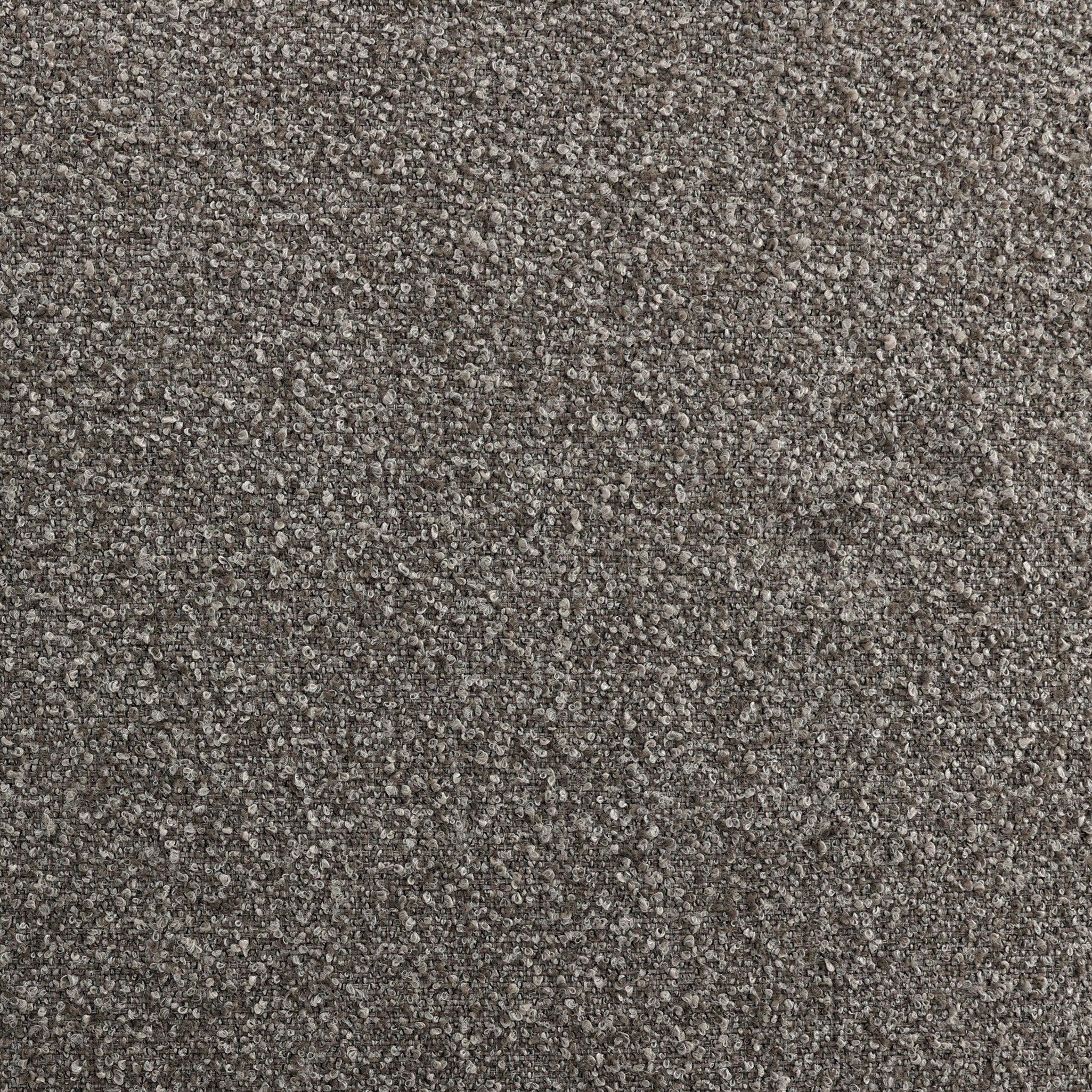 Close-up of a textured brown carpet