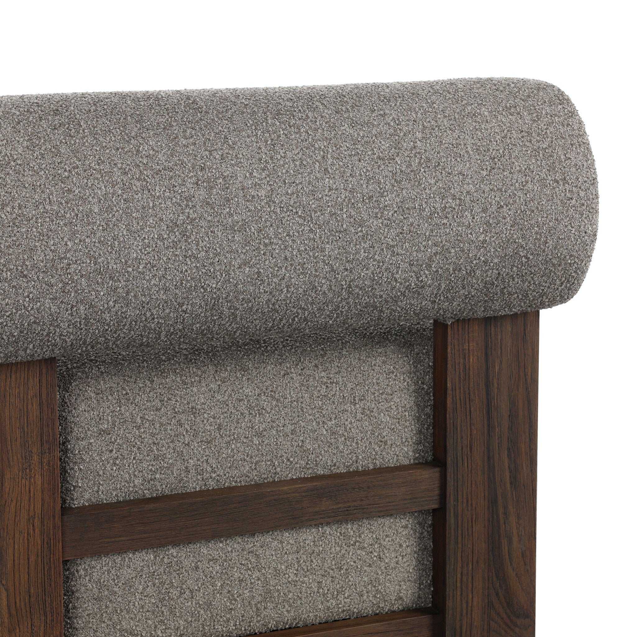Close-up of a gray upholstered chair with wooden frame on a white background