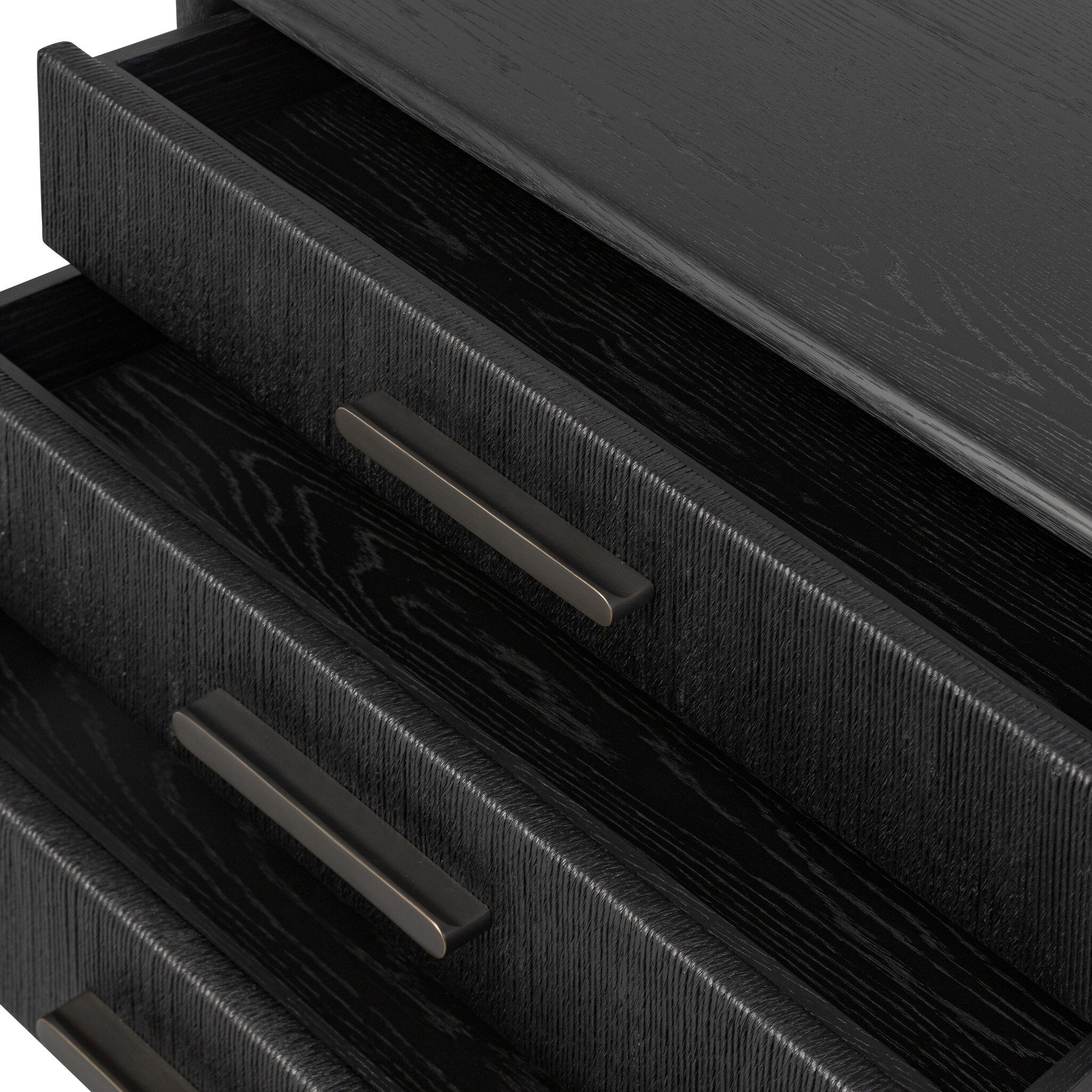 Close-up of a black wooden drawer with metal handles on a white background