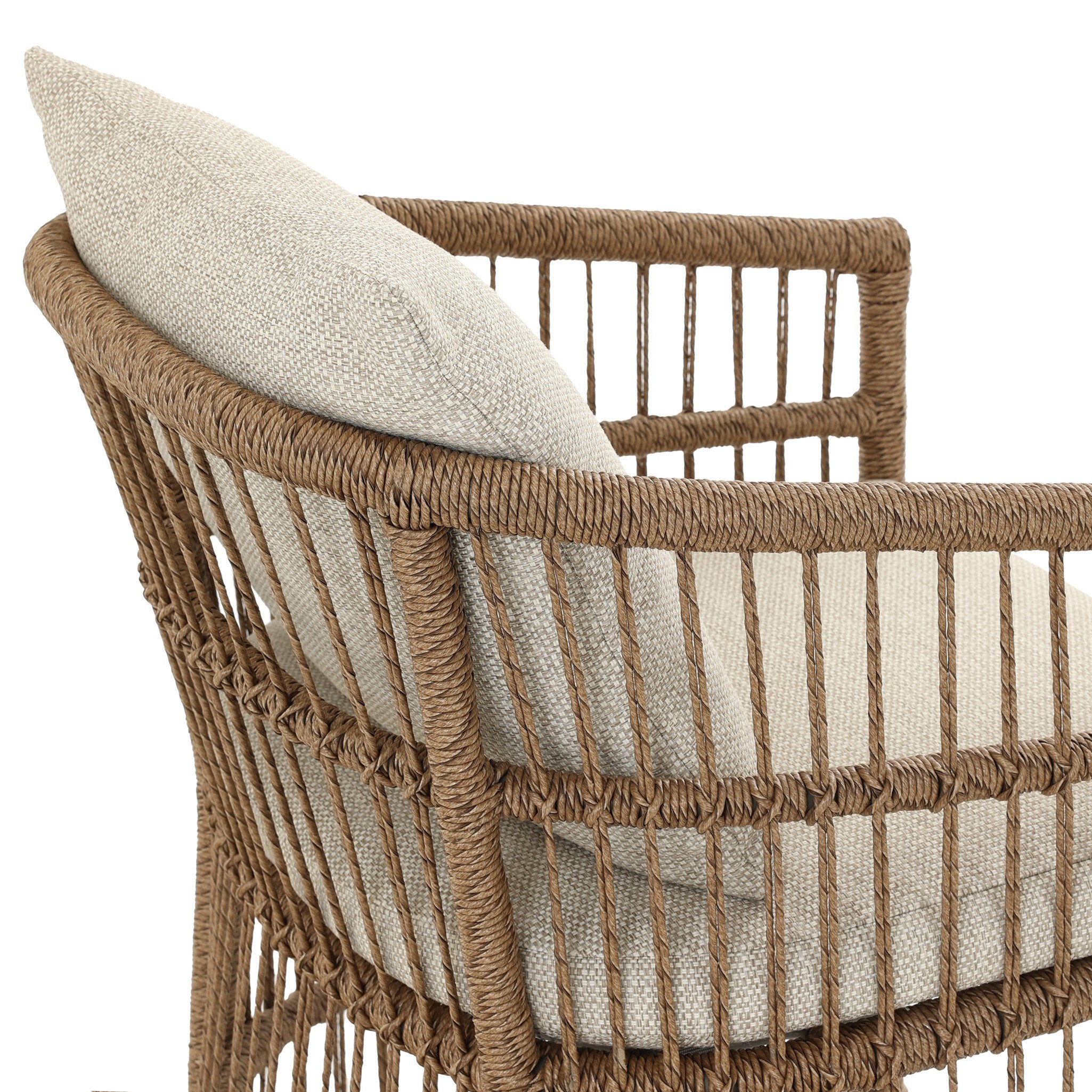 Wicker chair with a cushion on a white background