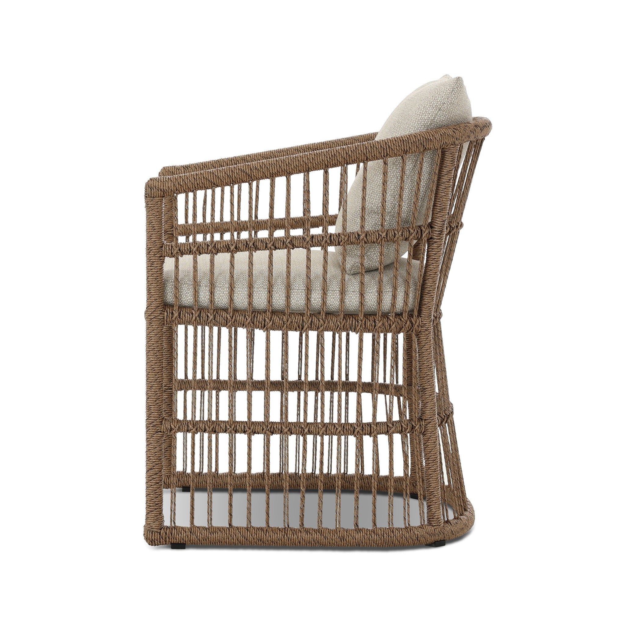 Wicker armchair with a cushion on a white background