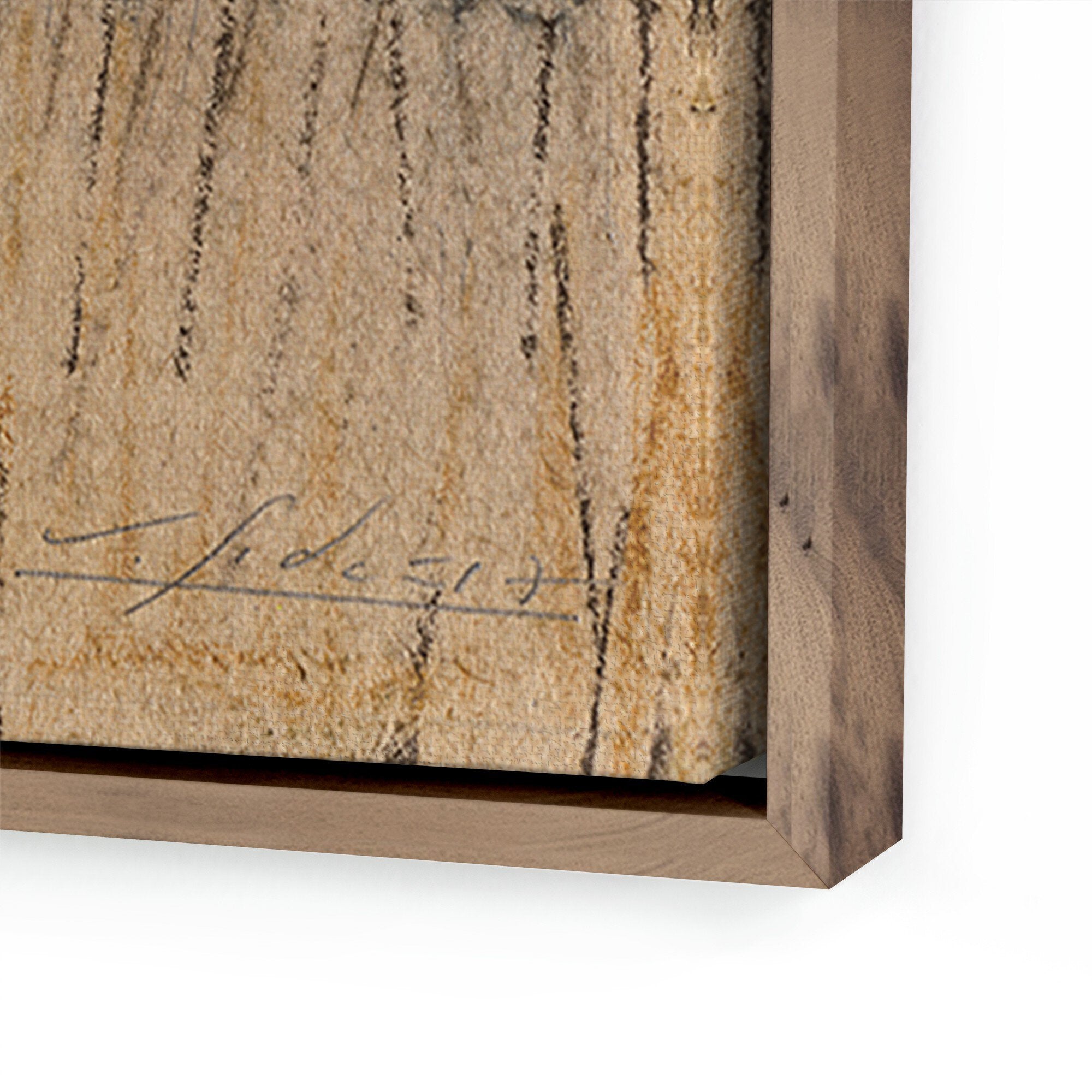 Close-up of a textured surface with a signature and wooden frame.