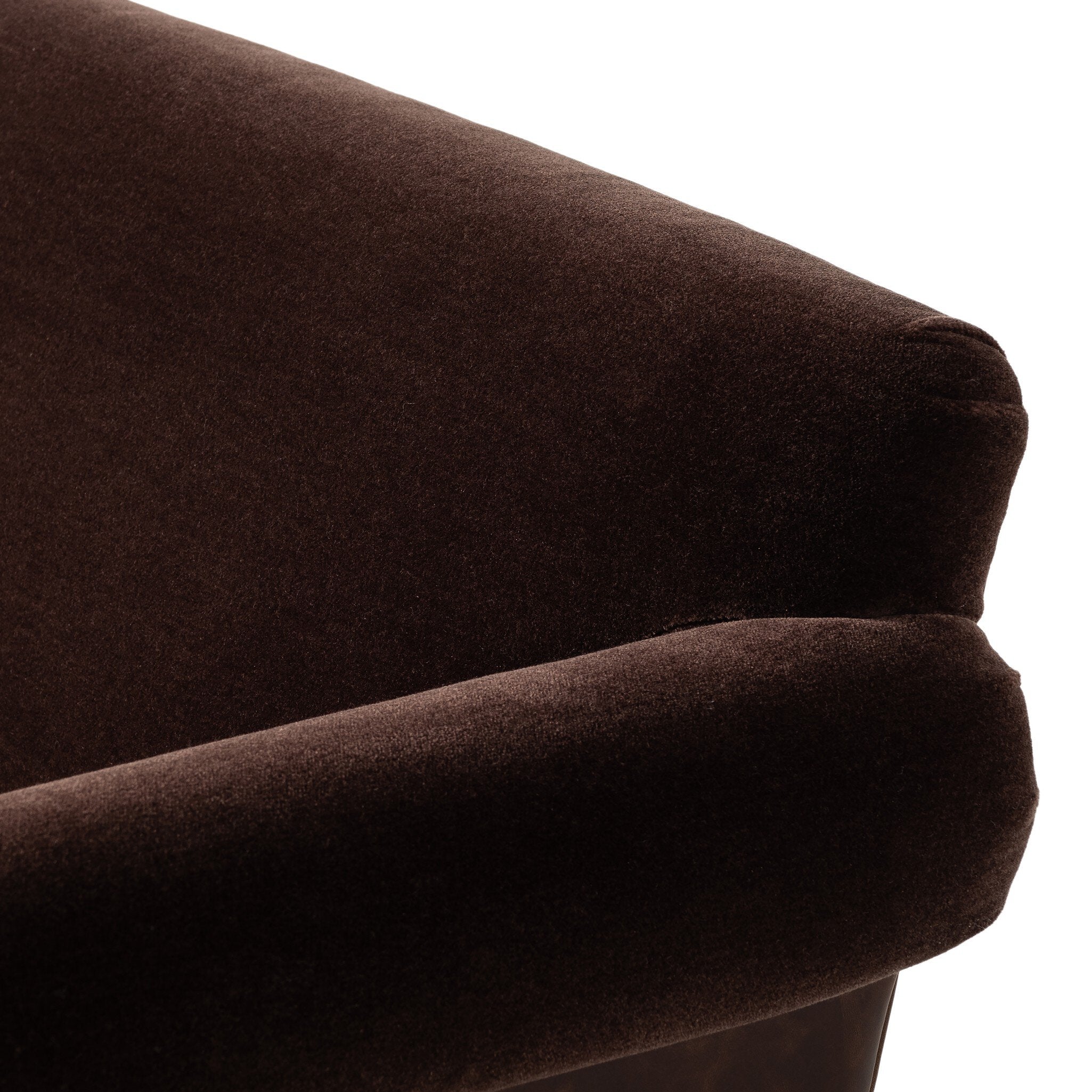 Close-up of a brown fabric surface with a soft texture.