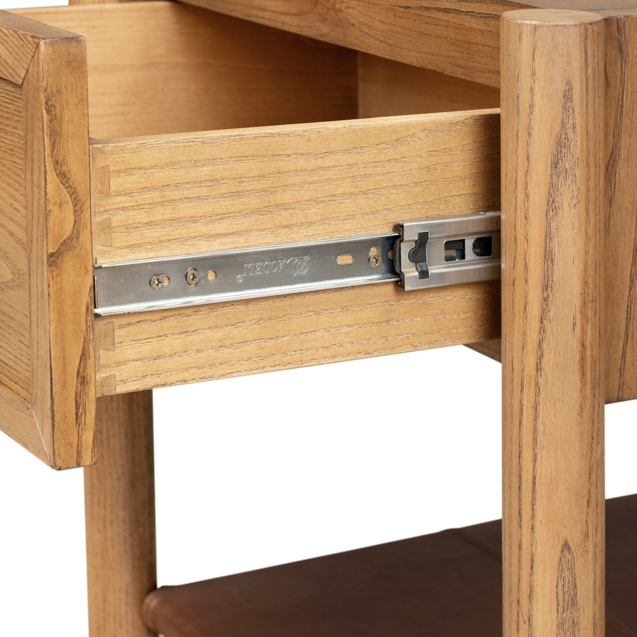 Close-up of a wooden drawer with a metal pull-out slide mechanism partially extended, showing the wood grain and hardware against a white background.