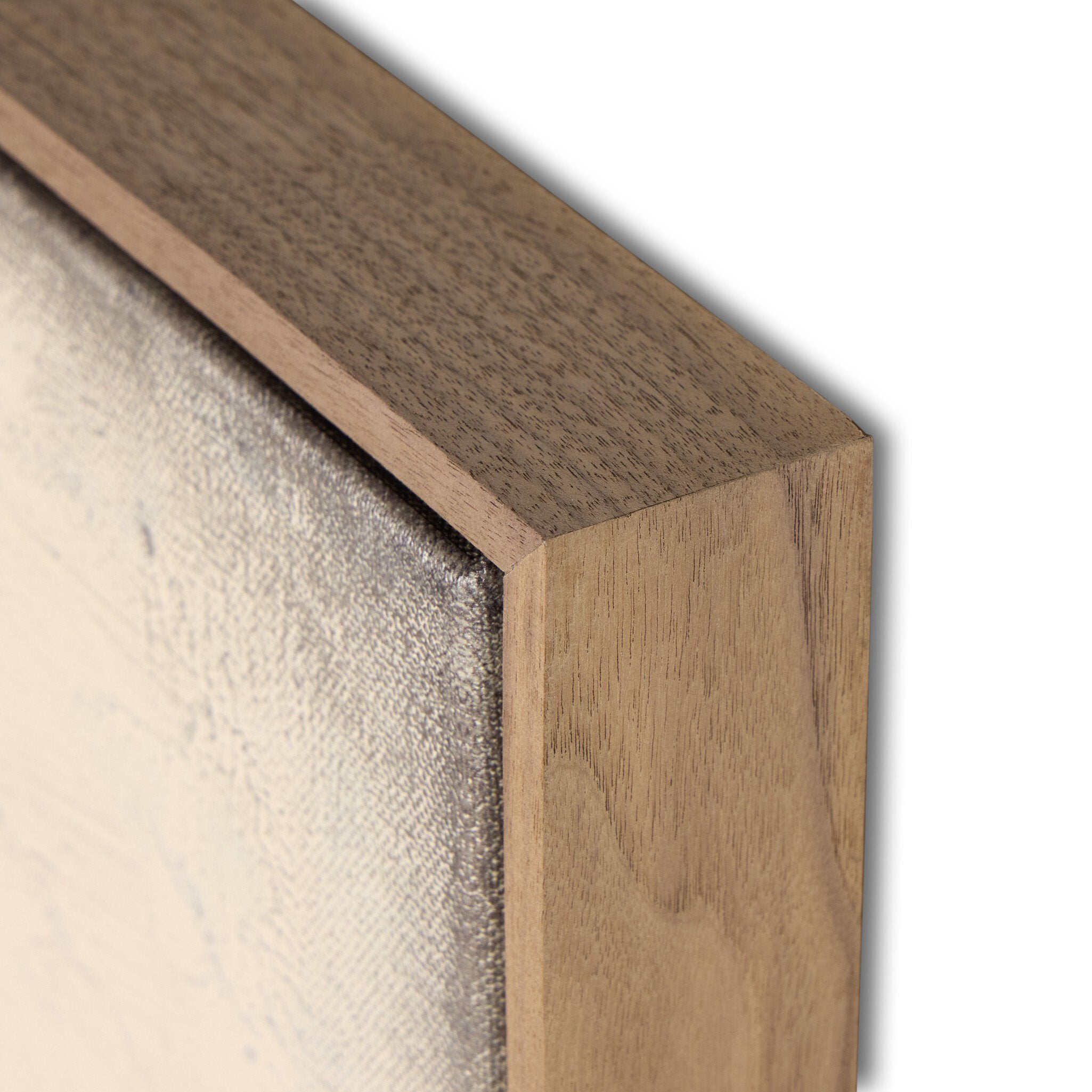 Close-up of a wooden picture frame corner on a white background