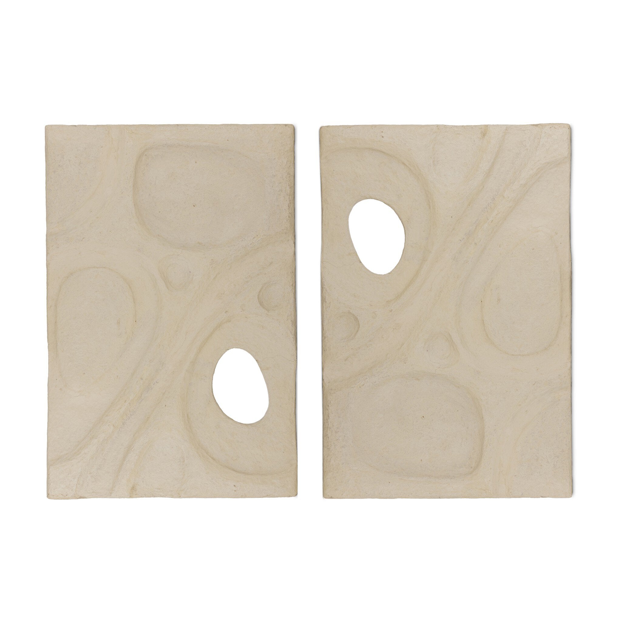 Two paper mache panels with cut-out shapes on a white background