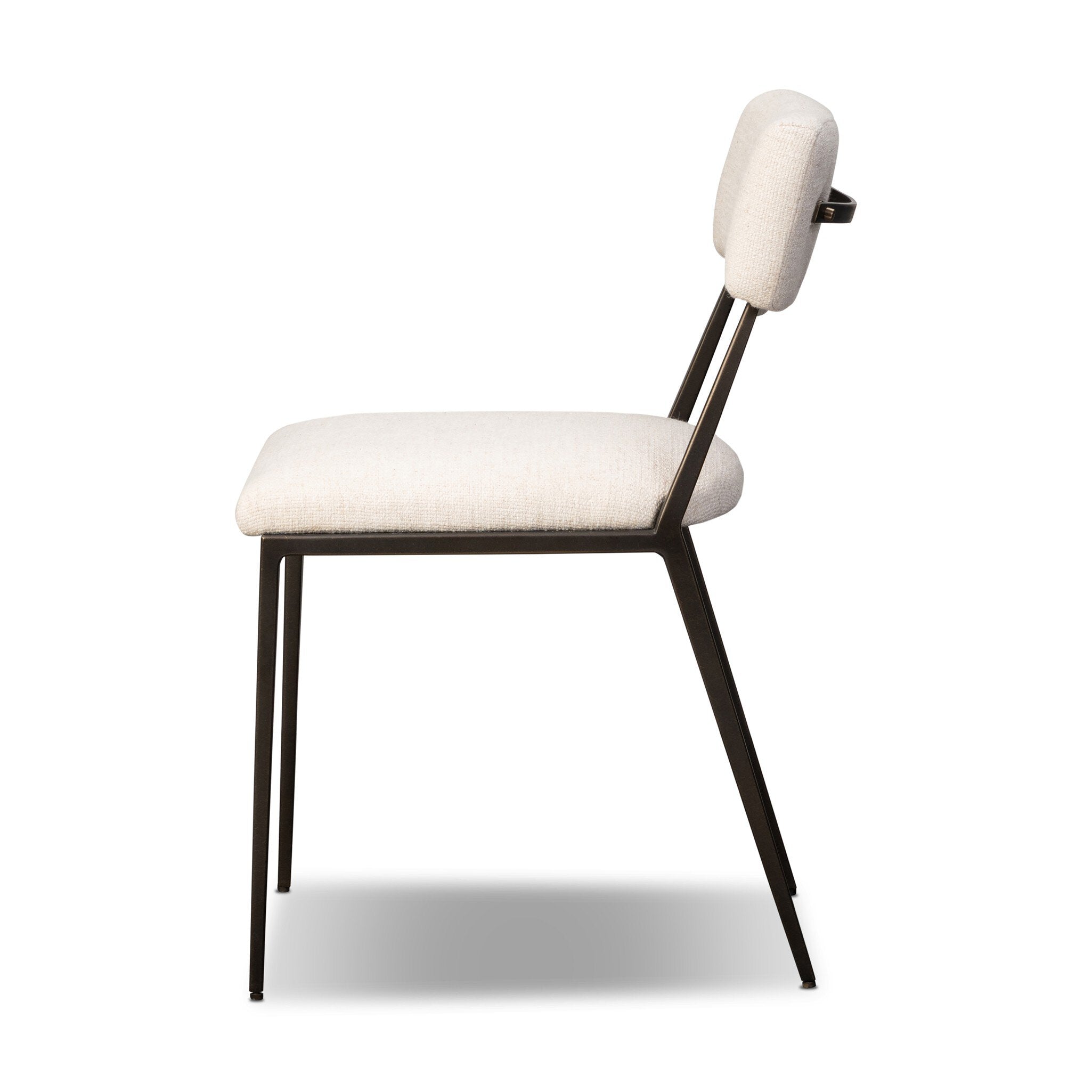 Modern chair with white cushioned seat and backrest on a white background