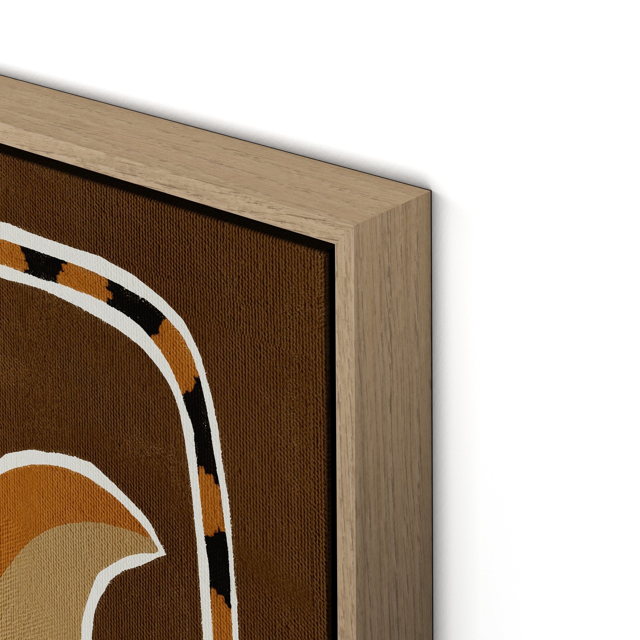 Close-up of a framed artwork with geometric patterns on a brown background.