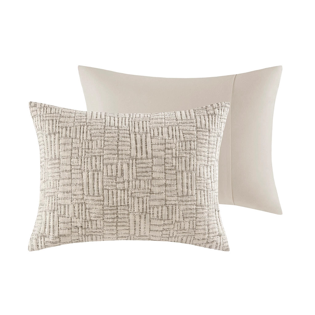 Two pillows, one with a textured pattern and one plain, on a white background