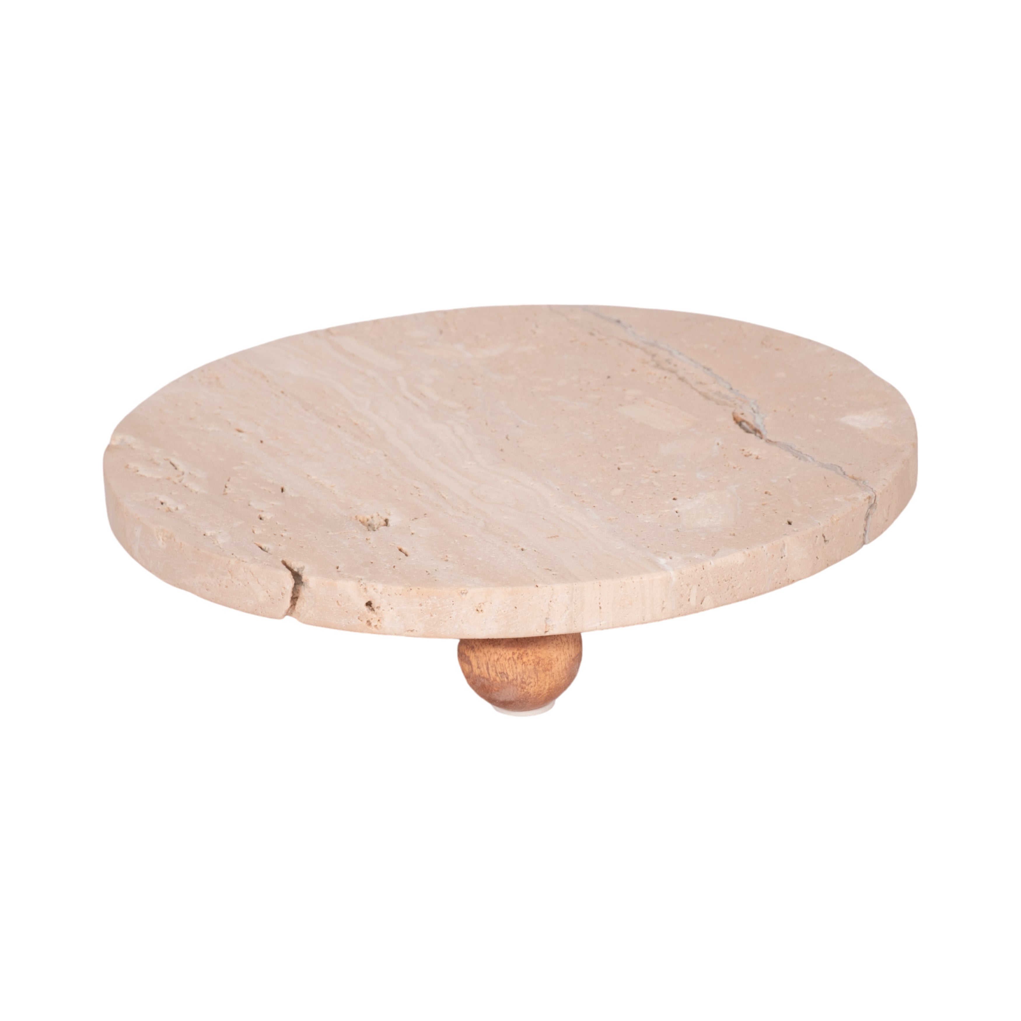 Round stone pedestal table on a white background