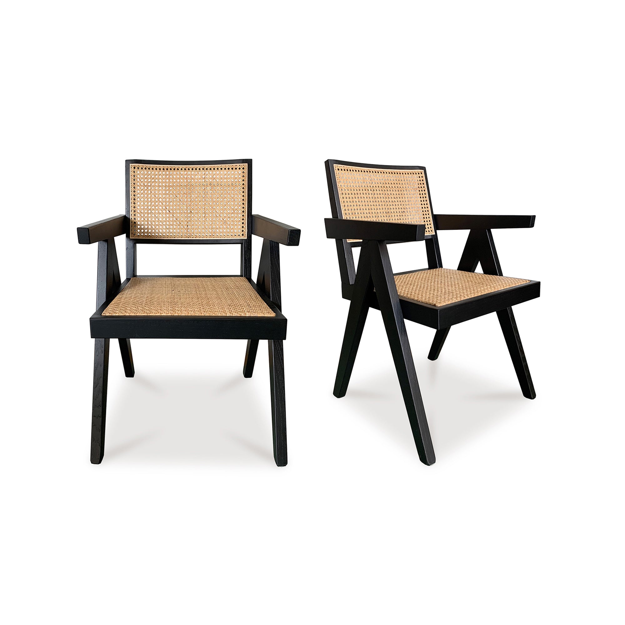 Two black chairs with woven cane seats and backrests on a white background