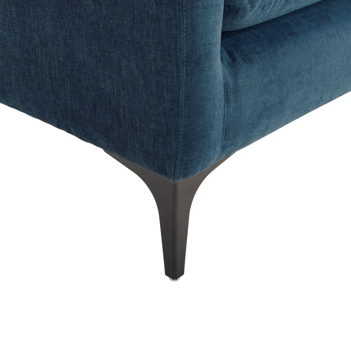 Close-up of a blue upholstered chair with a white background