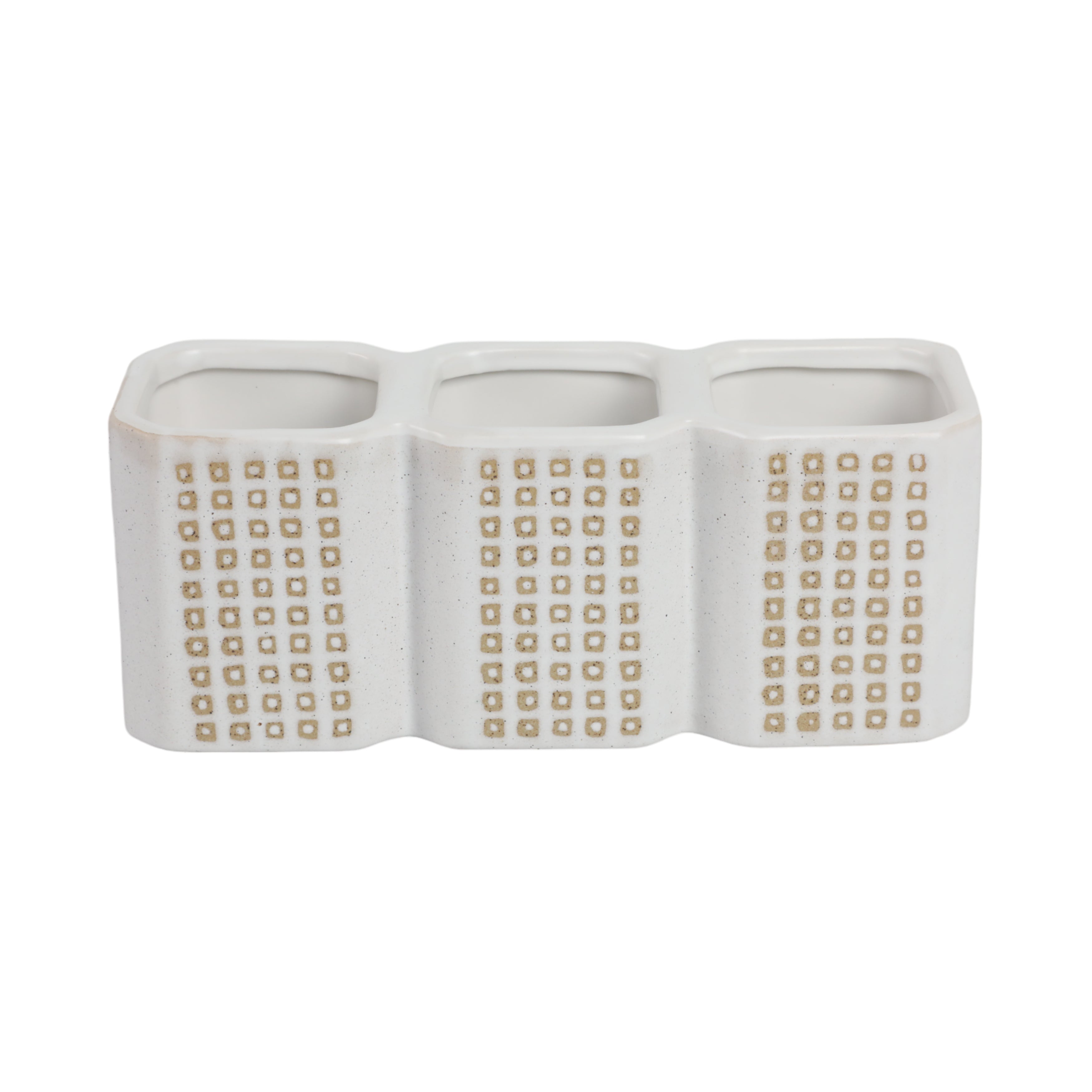 White ceramic planter with gold geometric pattern on a white background