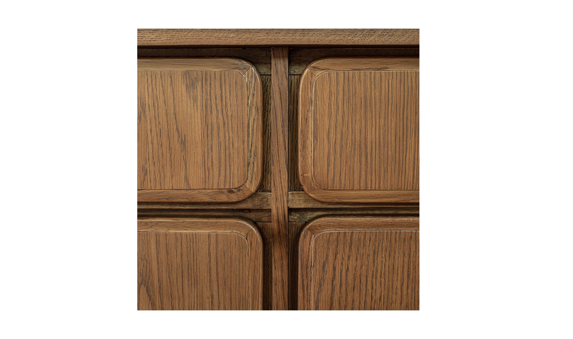 Detail of a wooden sideboard on a white background