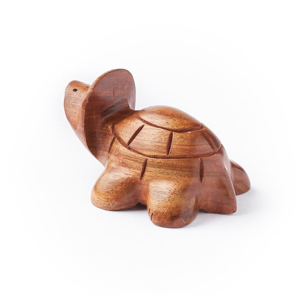 Wooden turtle glasses holder on a white background