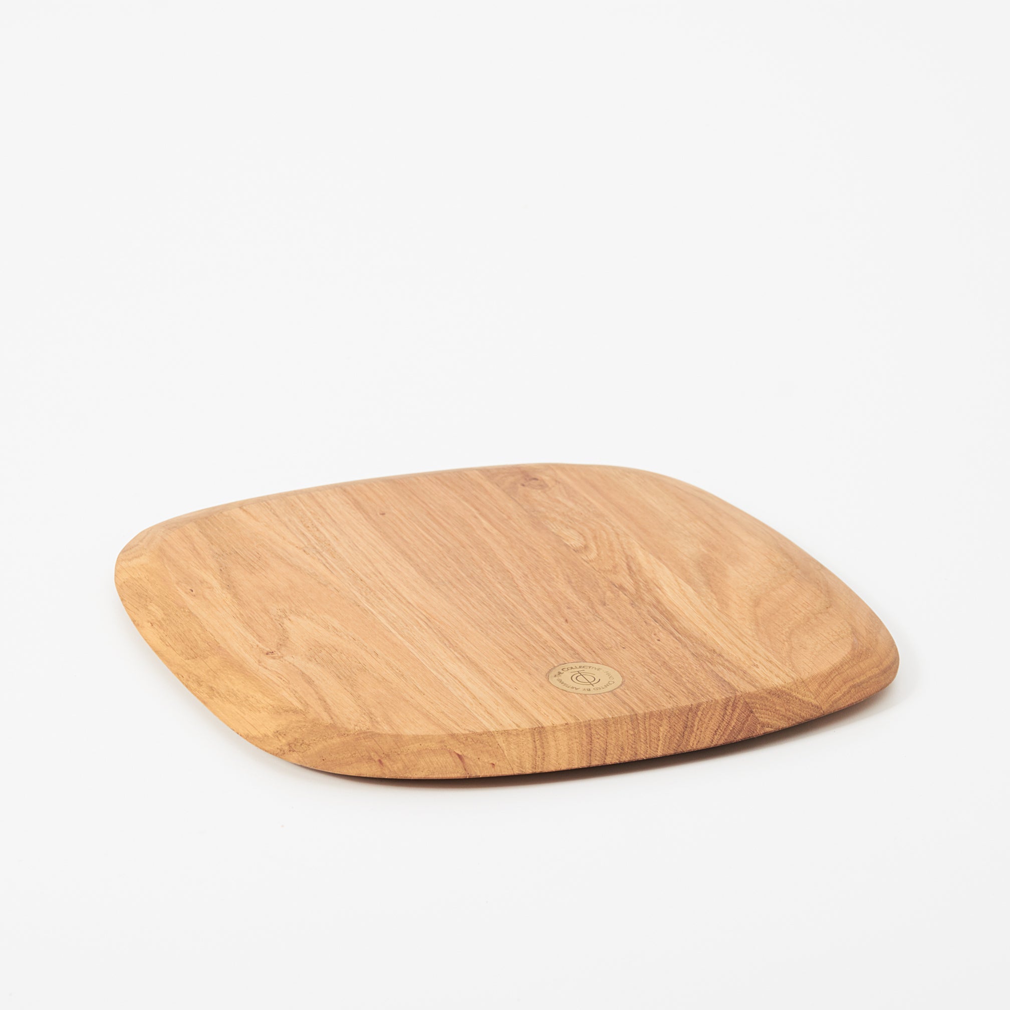 Wooden serving board on a white background