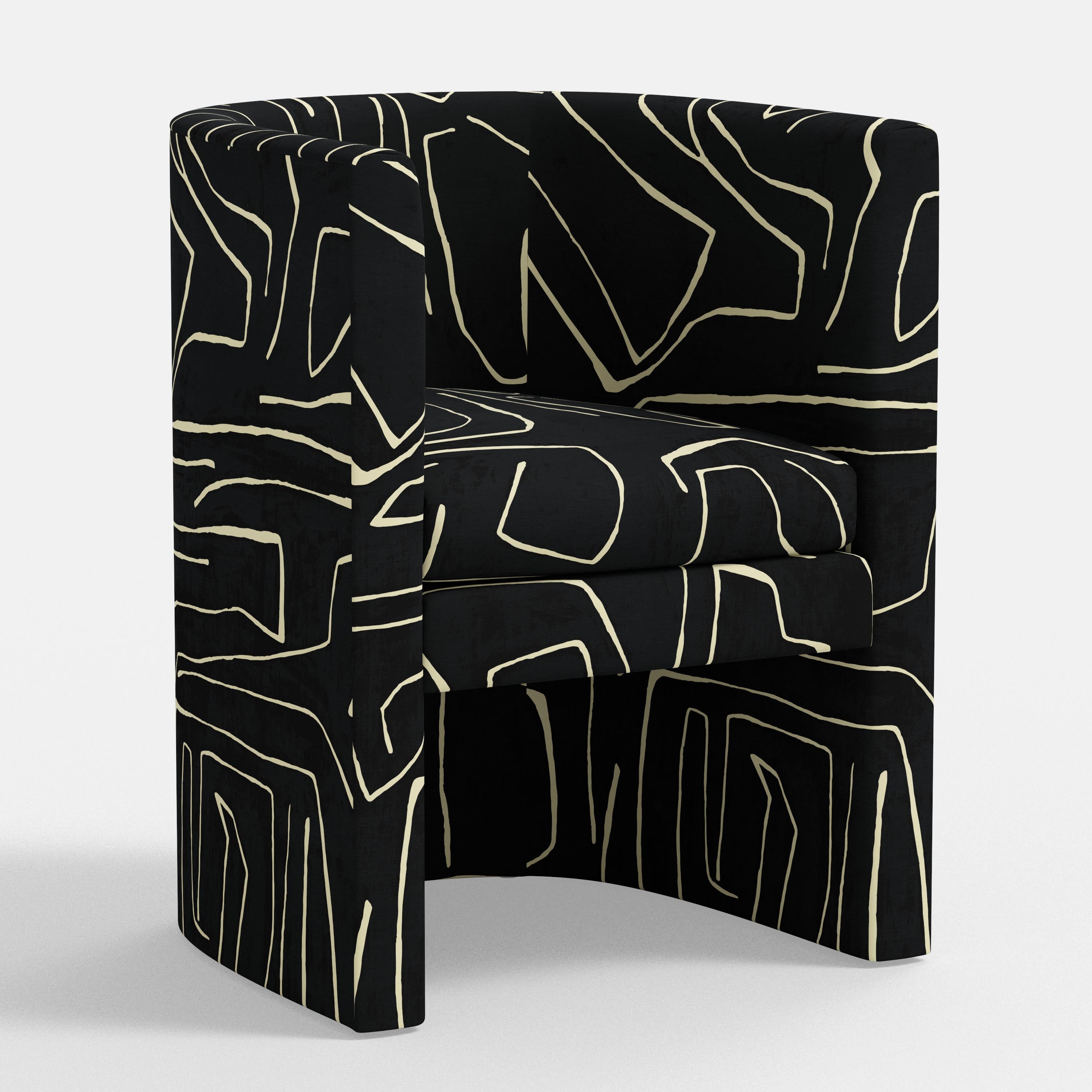 Black armchair with white abstract patterns on a white background