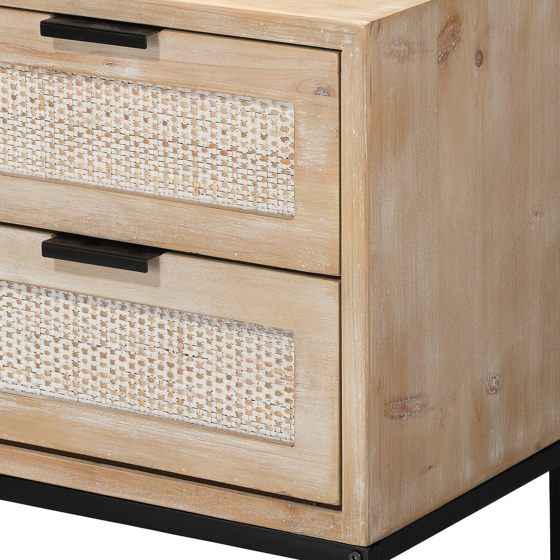 Wooden sideboard with wicker drawer fronts on a white background
