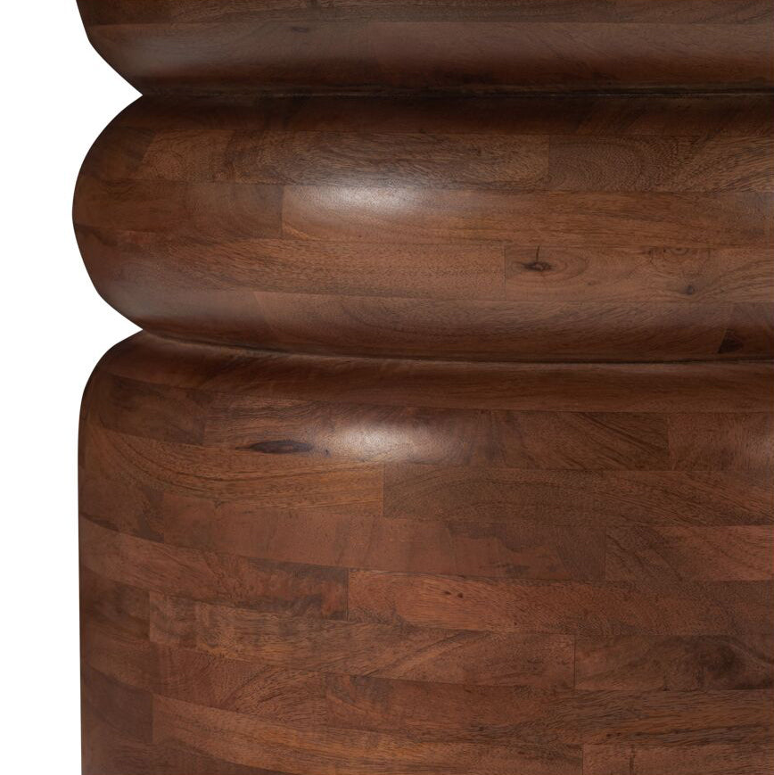 Close-up of a dark brown wooden furniture piece showing the polished wood grain and stacked panel construction against a white background.