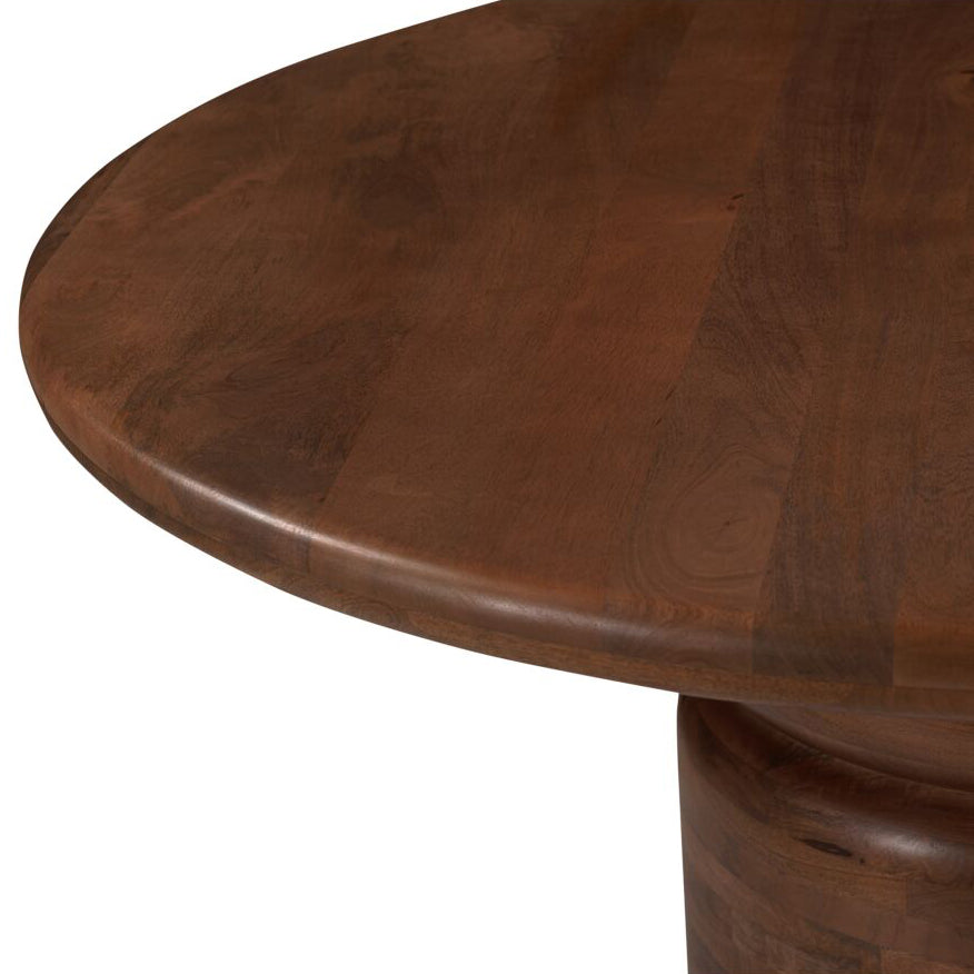 Close-up of a round wooden table top with a warm medium-brown finish and visible wood grain, shown against a white background.