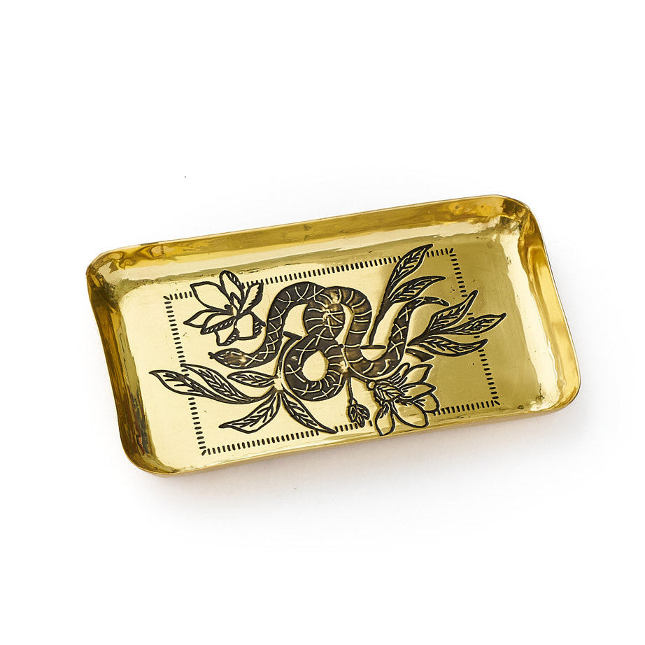 Gold rectangular catchall tray with engraved snake on a white background