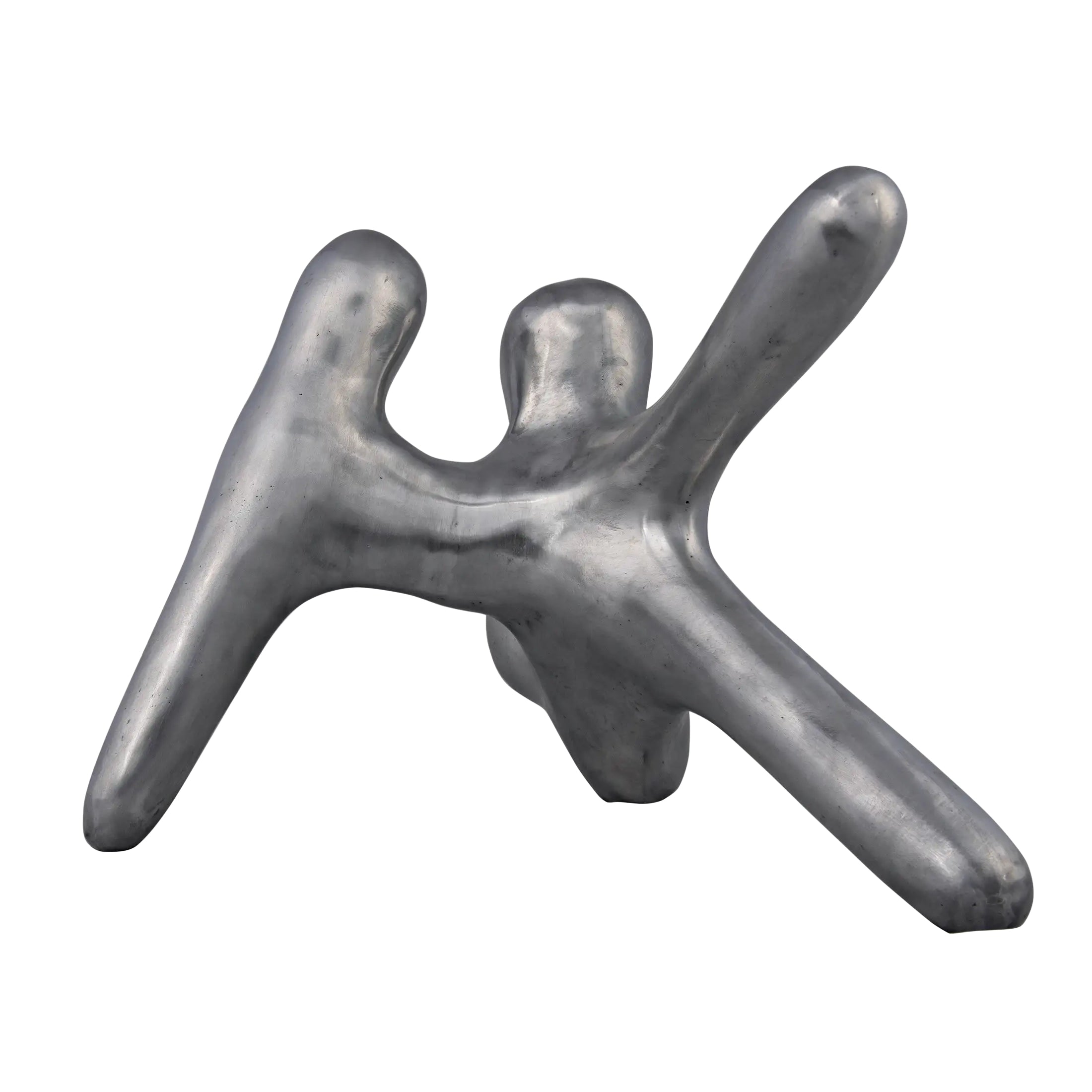 Metallic abstract sculpture on a white background