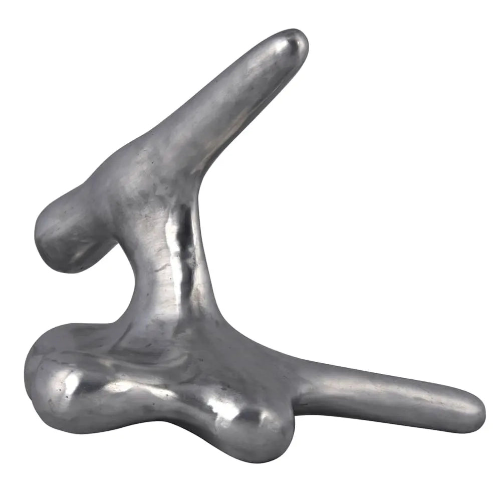Metallic, abstract sculpture on a white background