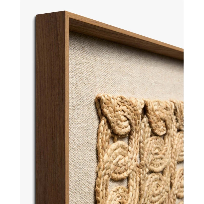 Close-up of a woven pattern with a wooden frame on a white background
