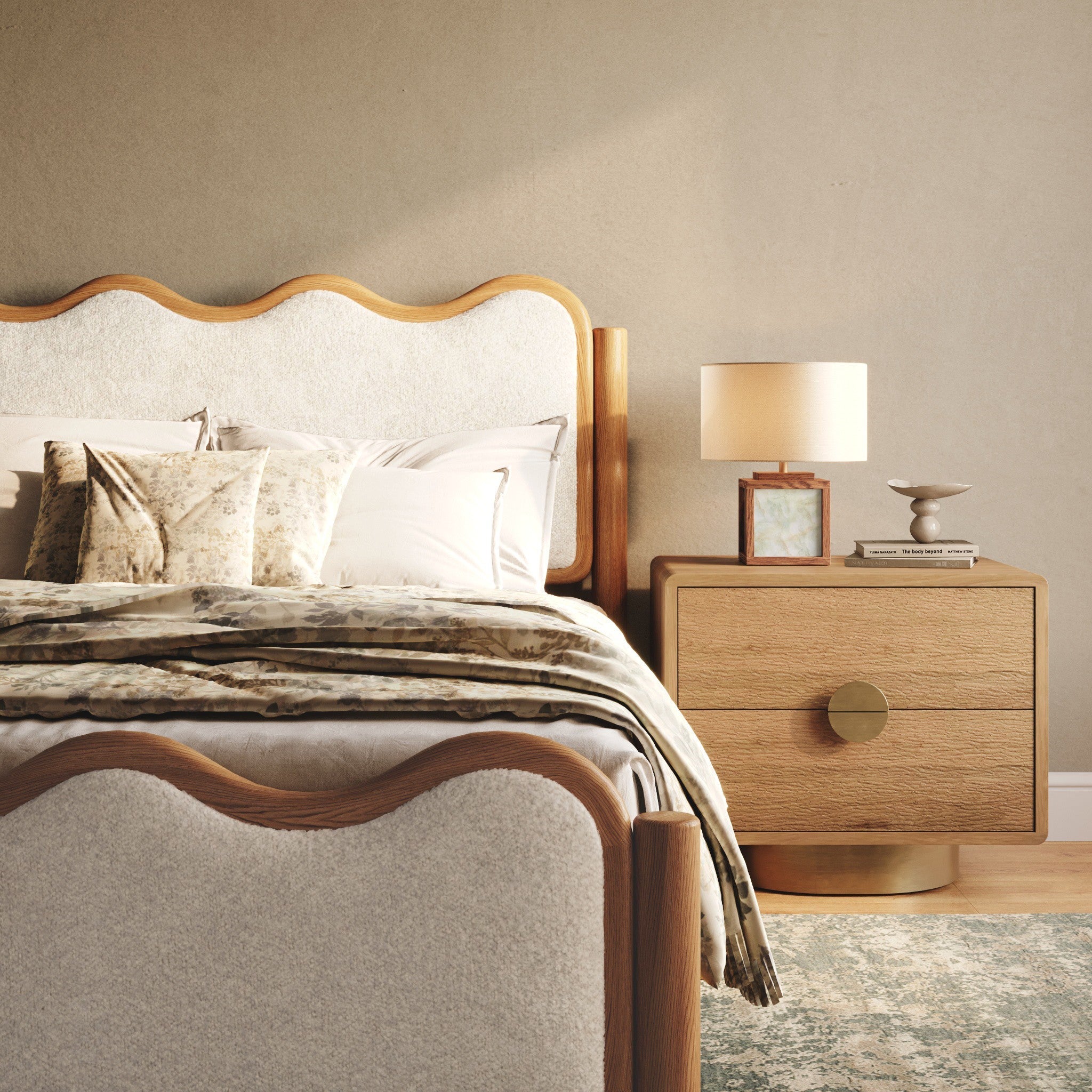 Bedroom with a boucle upholstered bed with a wavy headboard and footboard along with a contemporary nightstand against a beige wall