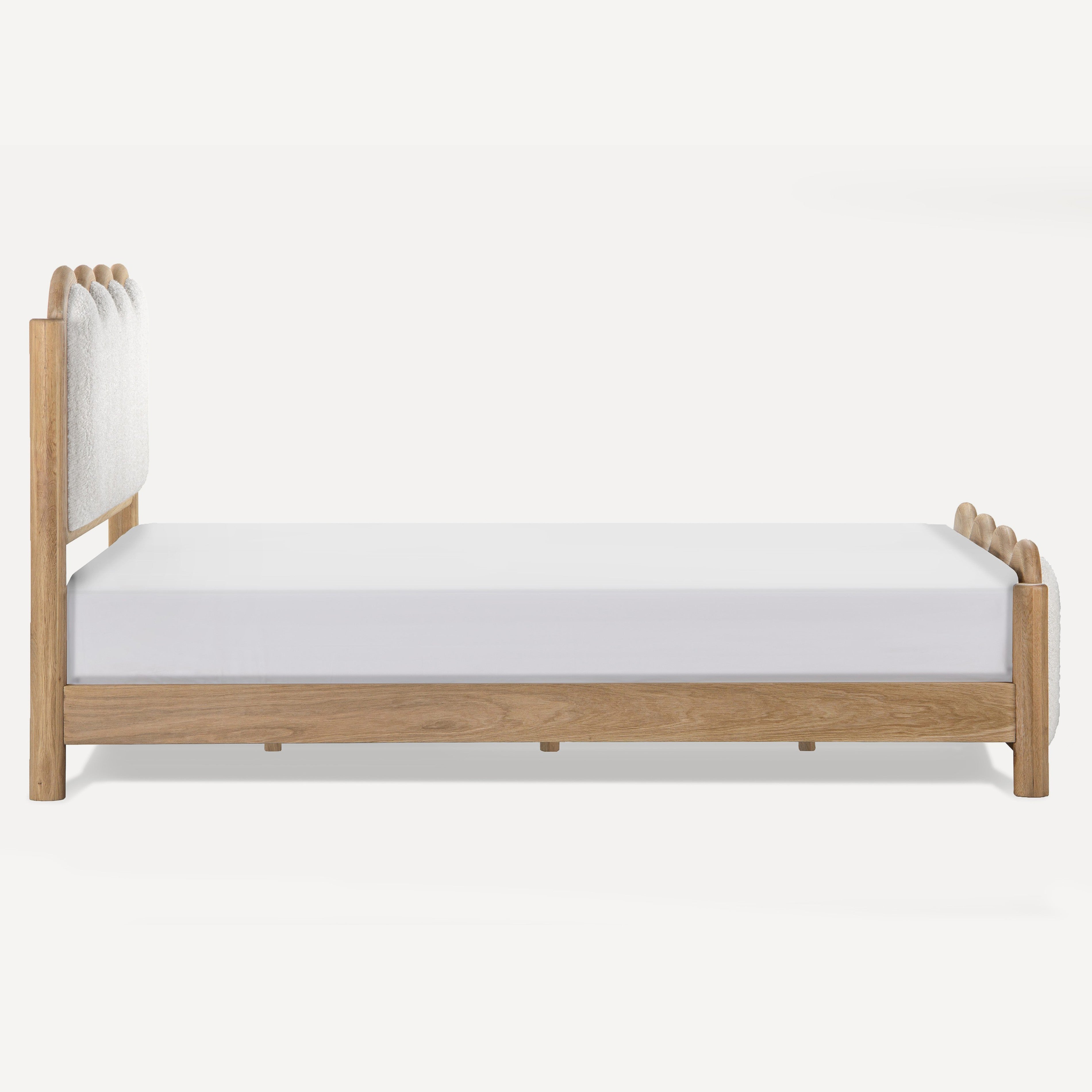 A modern single bed frame made of light natural wood with a tall upholstered headboard and matching side rails, shown on a plain white background.