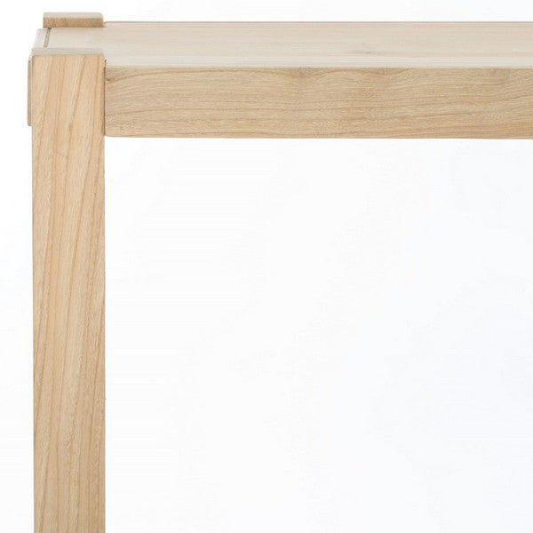 Close-up of a wooden frame with a white surface on a white background