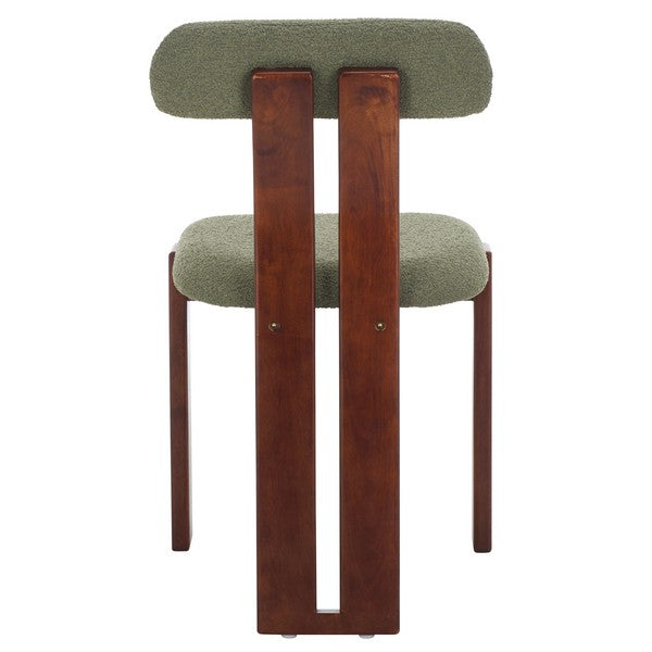 Chair with green cushioned seat and backrest on a white background