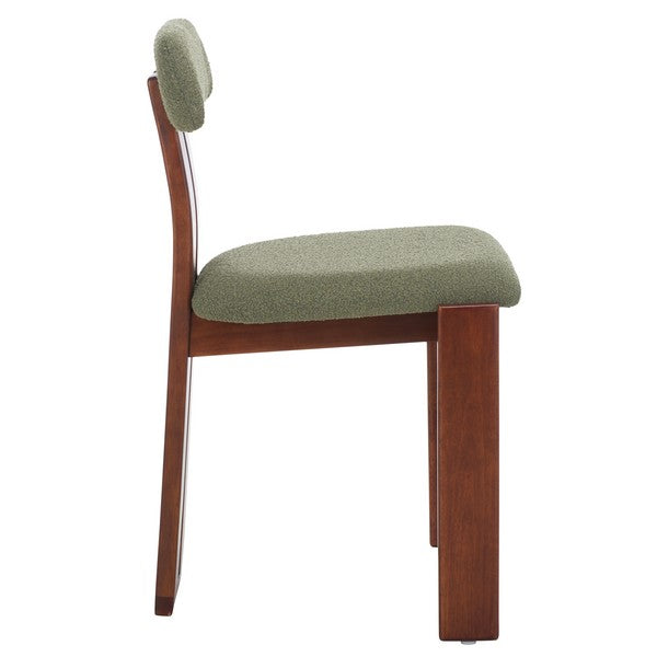 Chair with green cushioned seat and backrest on a white background