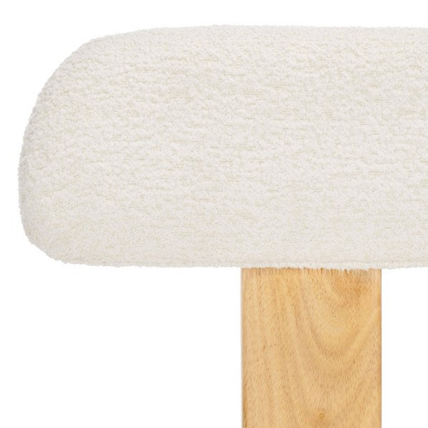 Wooden chair with white cushion on a white background