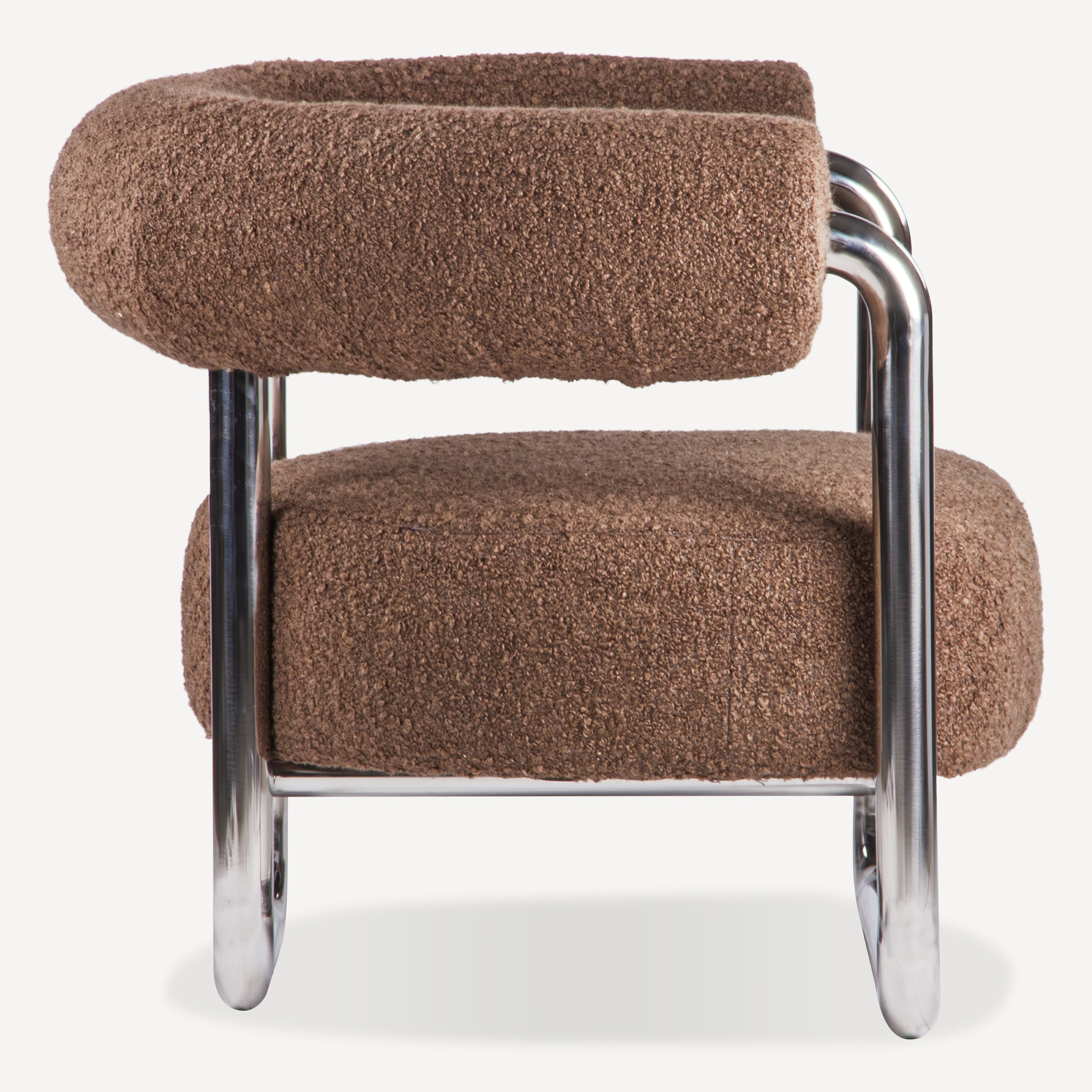 Brown upholstered chair with chrome frame on a white background