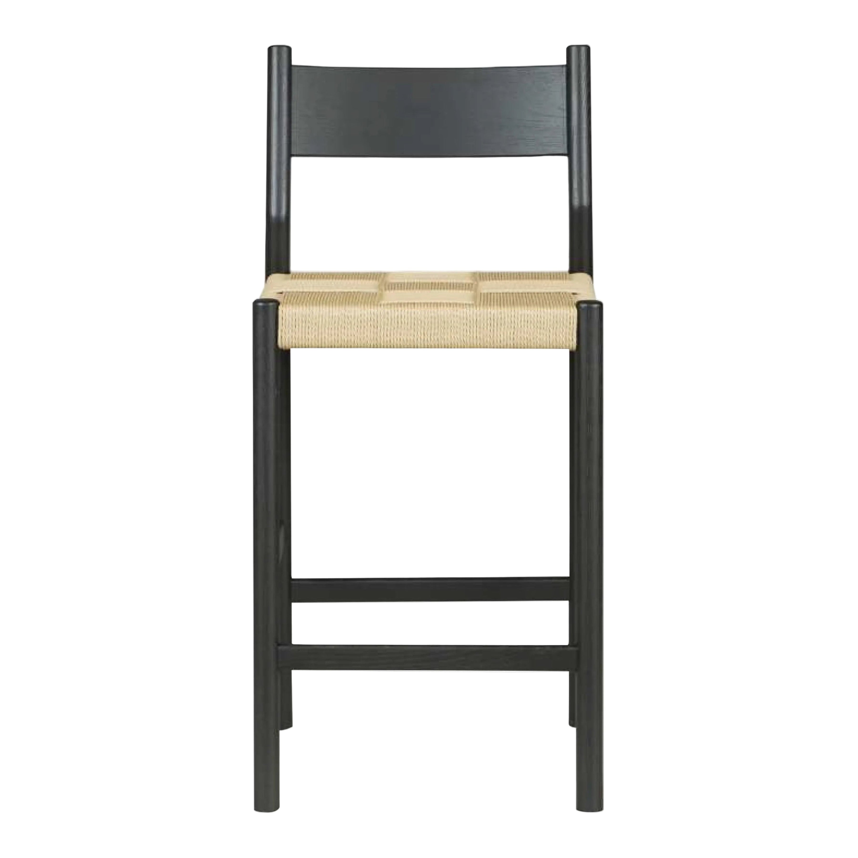 A modern bar stool with a black wood frame and a woven natural fiber seat, shown against a plain white background.