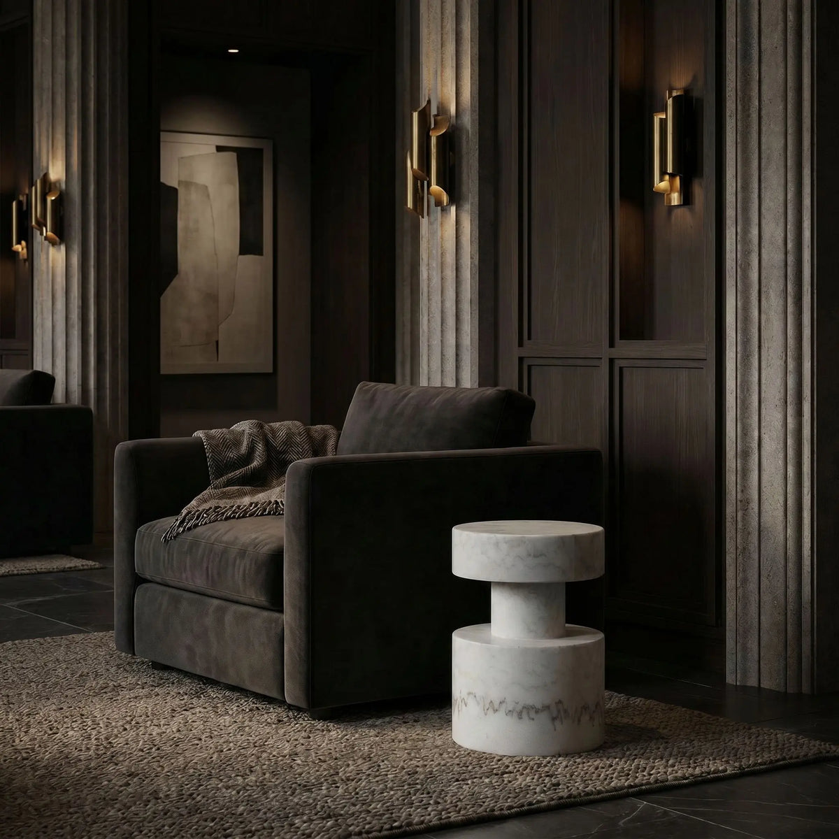Modern living room with a gray sofa and marble side table.