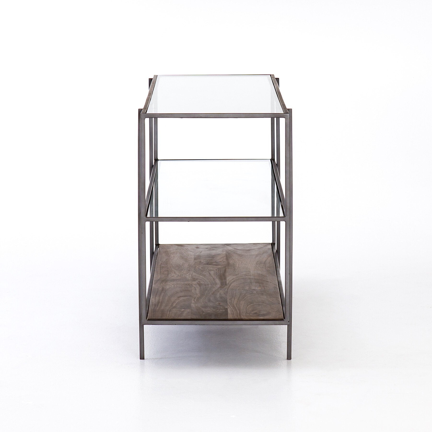 Small side table with glass top and wooden shelf on a white background