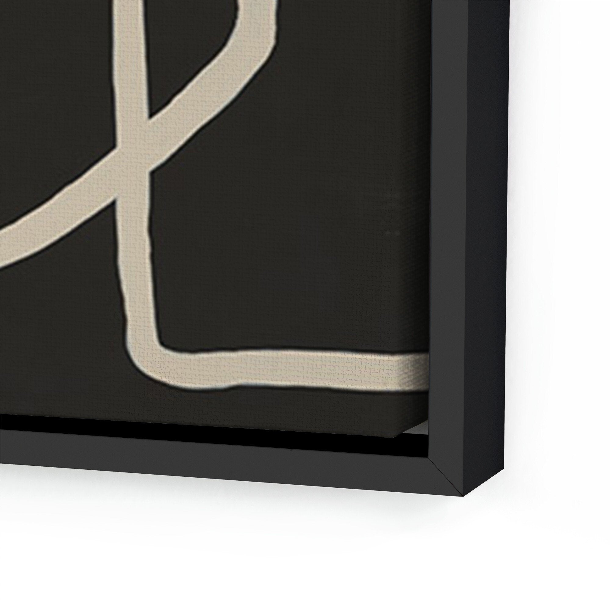 Close-up of a black frame and abstract black and white pattern