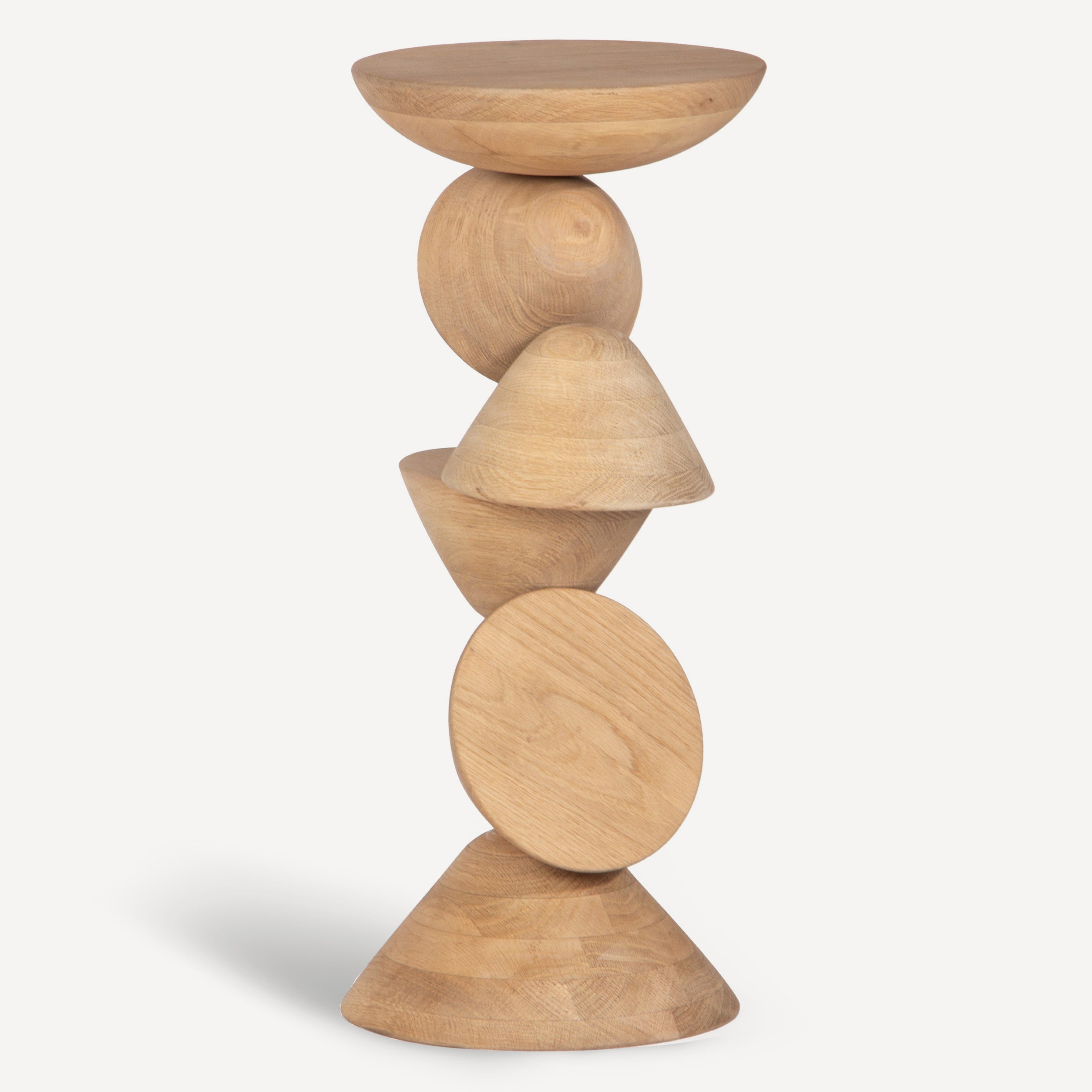 Wooden side table with stacked cylindrical shapes on a white background