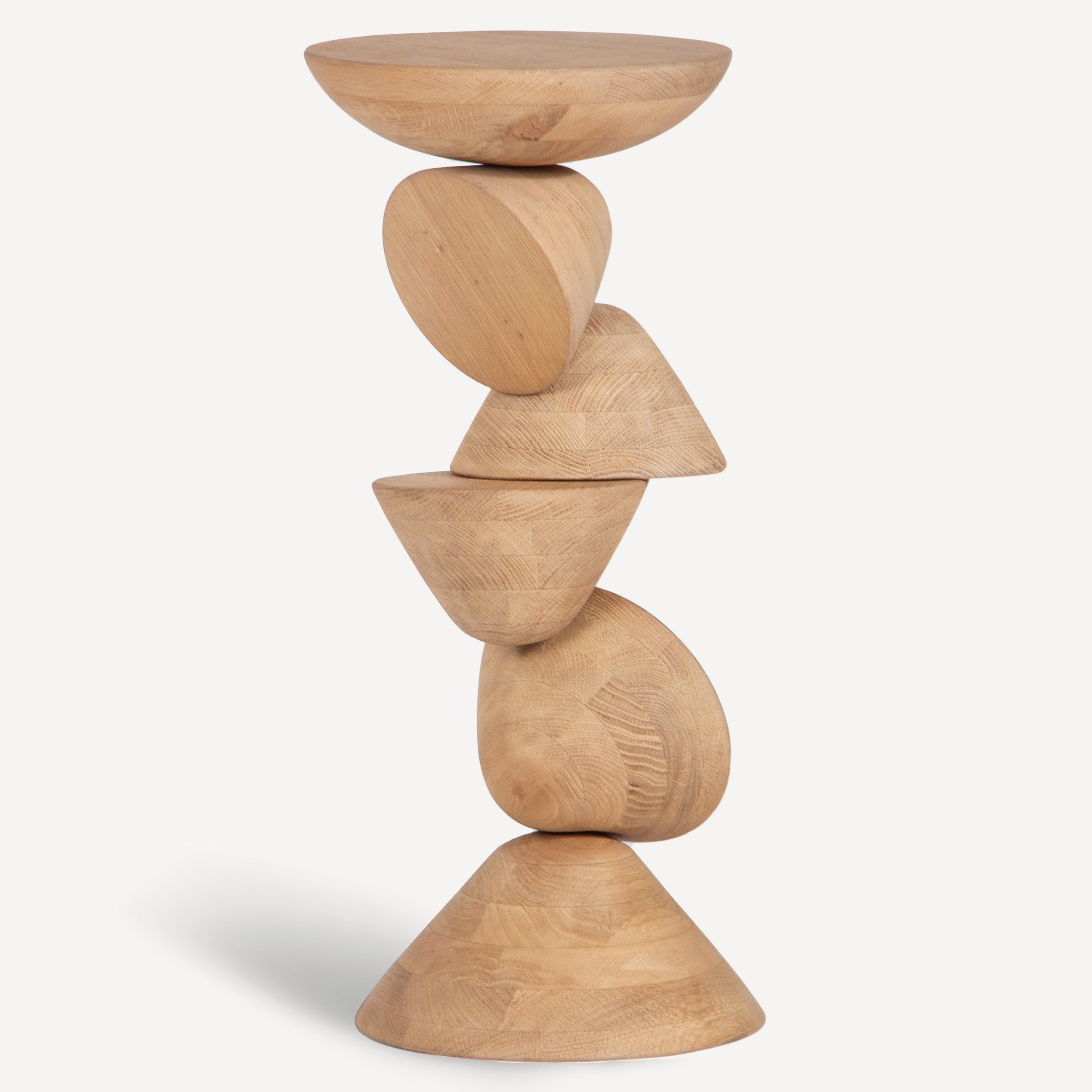 Oak side table with stacked design on white background