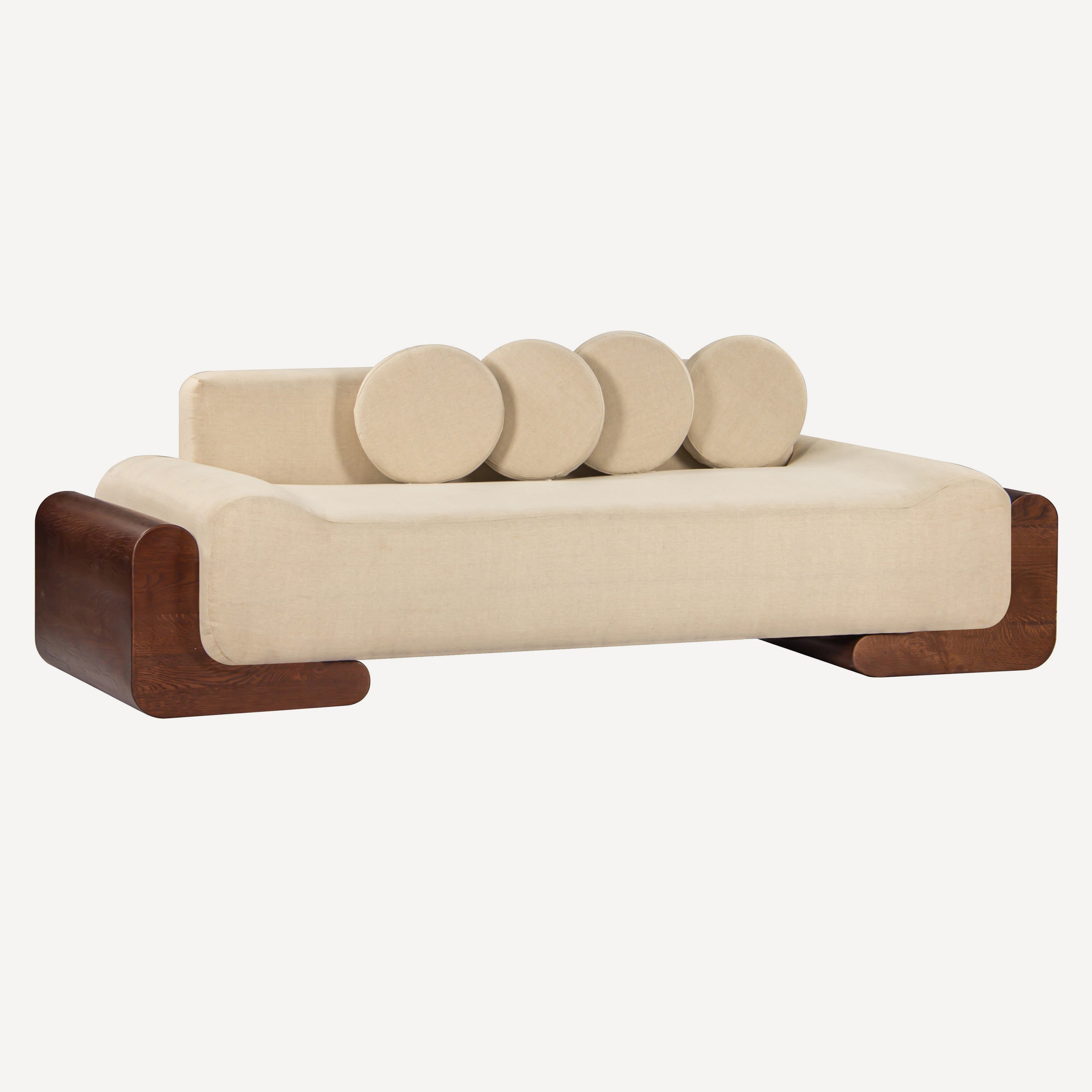 Sofa with circular cushions on a white background