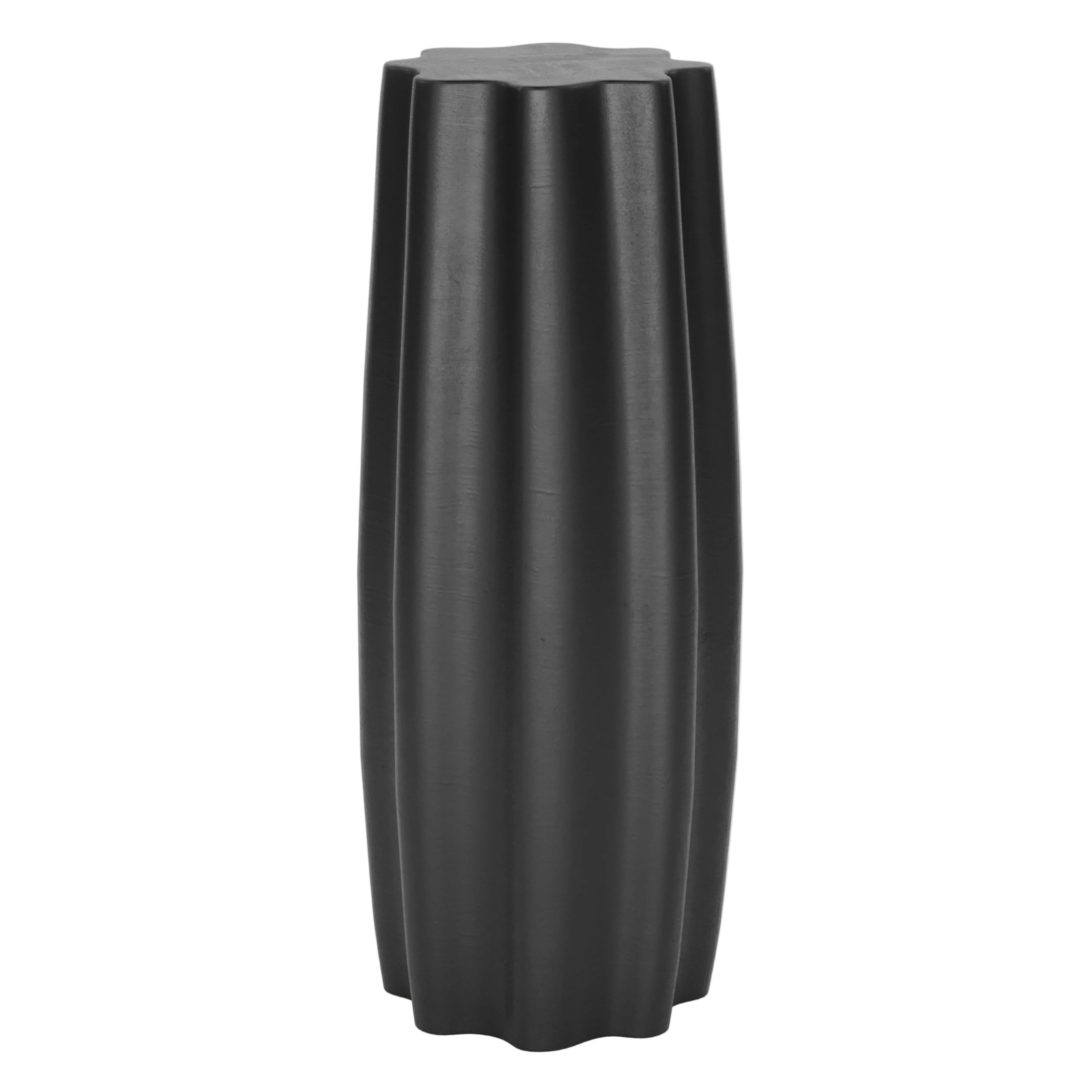 Back concrete pedestal side table with fluted edges on white background.
