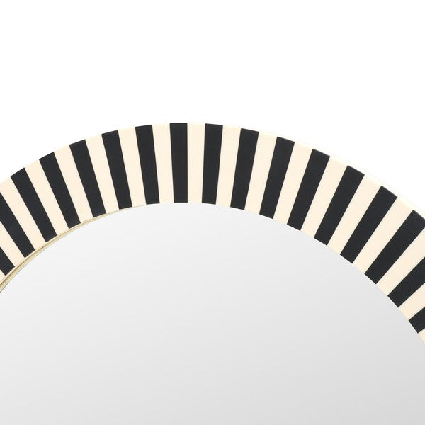Round mirror with black and beige striped border on a white background