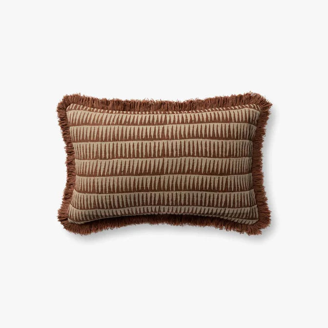 Textured brown and beige pillow with frayed edges on a white background