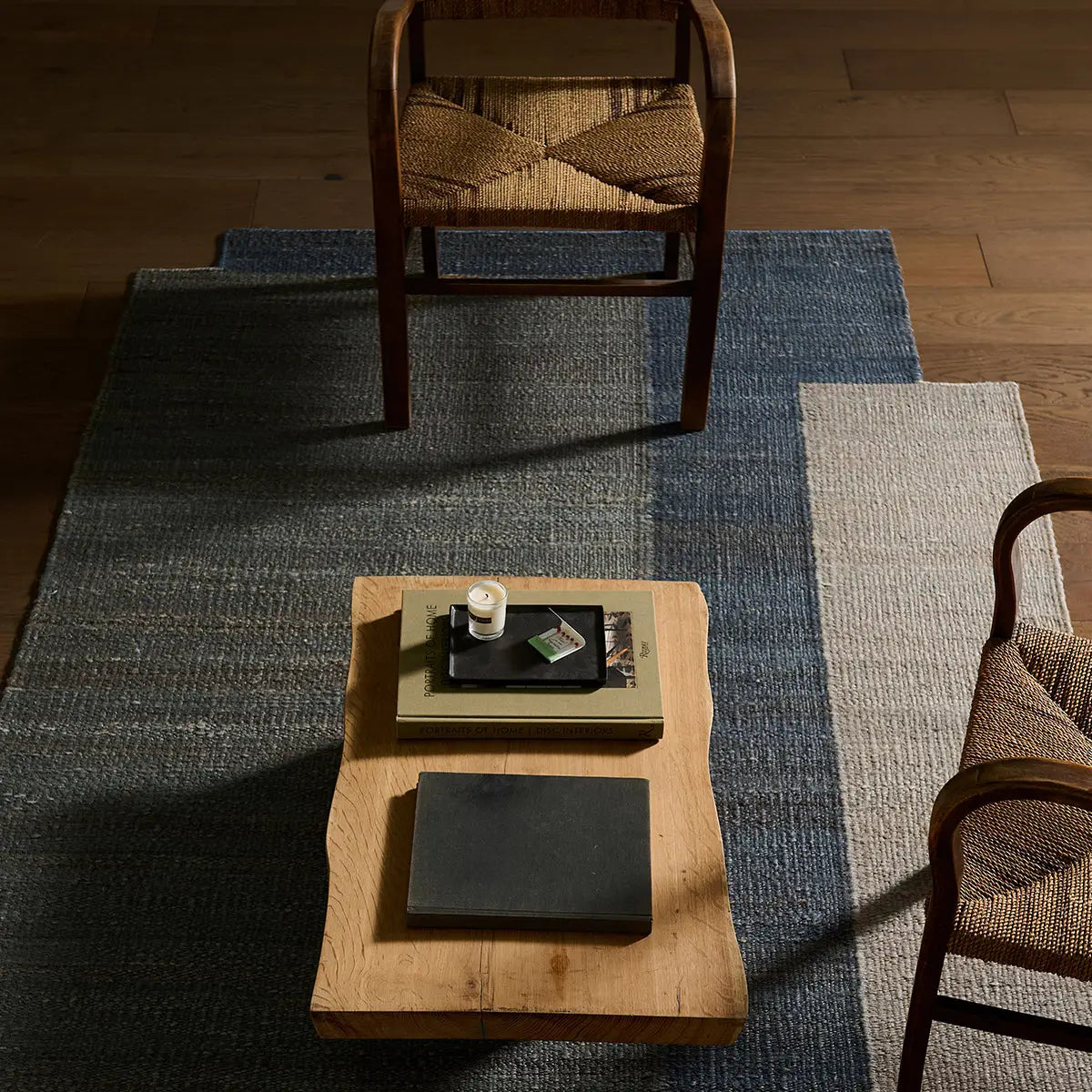 Rug with geometric pattern in a room with wooden furniture