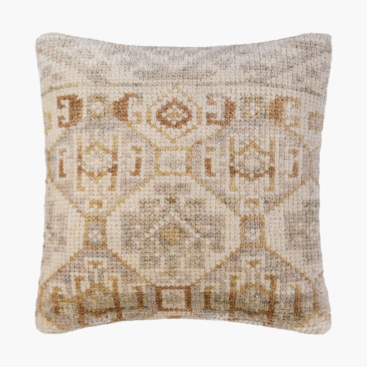 Textured pillow with geometric pattern on a white background