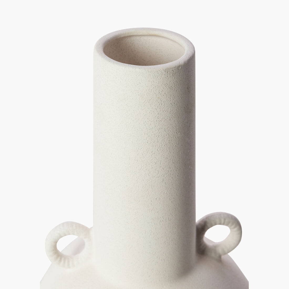 White ceramic vase with two handles on a white background