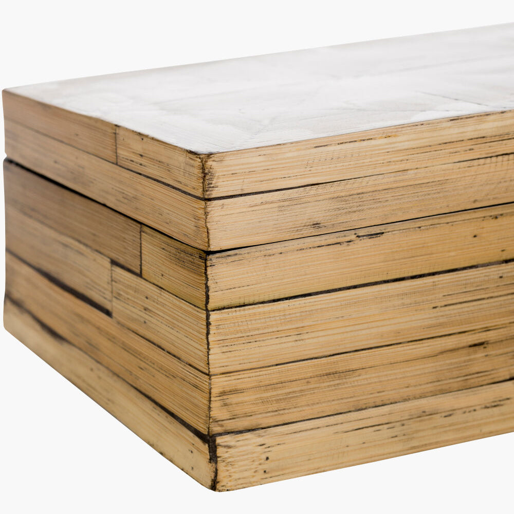 Wooden box with a white top on a white background
