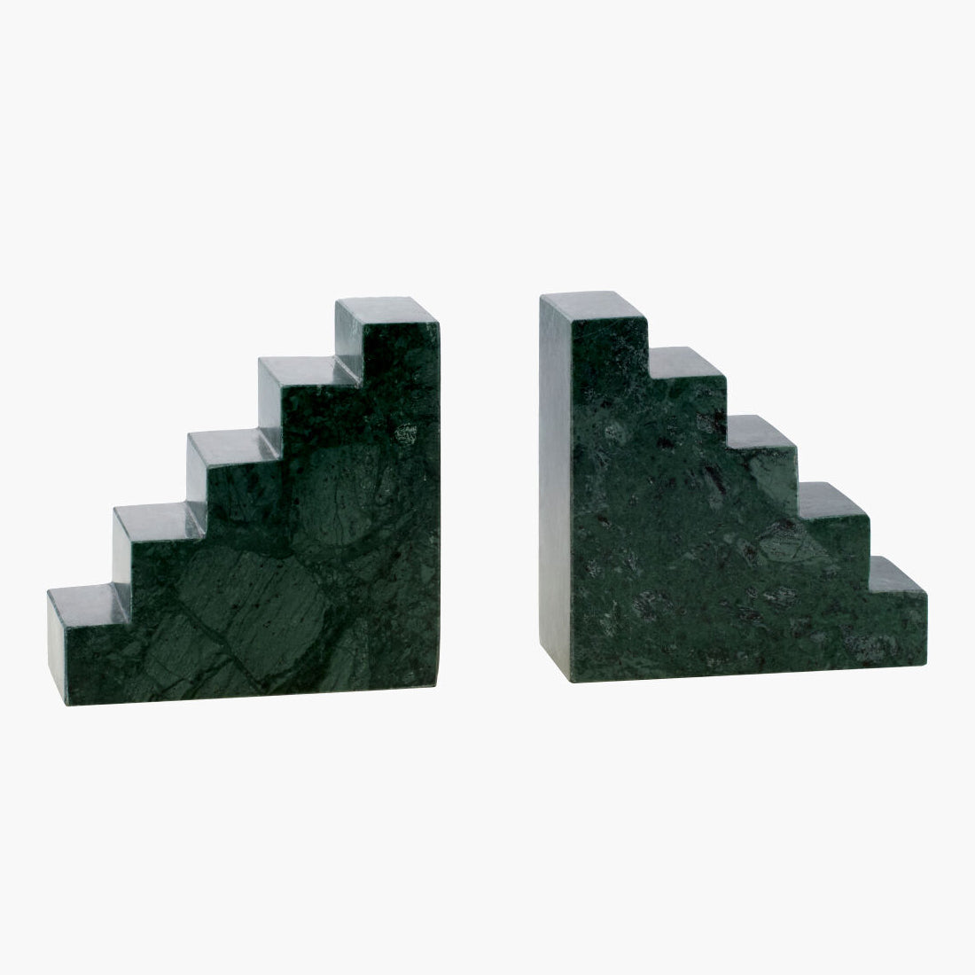 Two green marble bookends on a white background